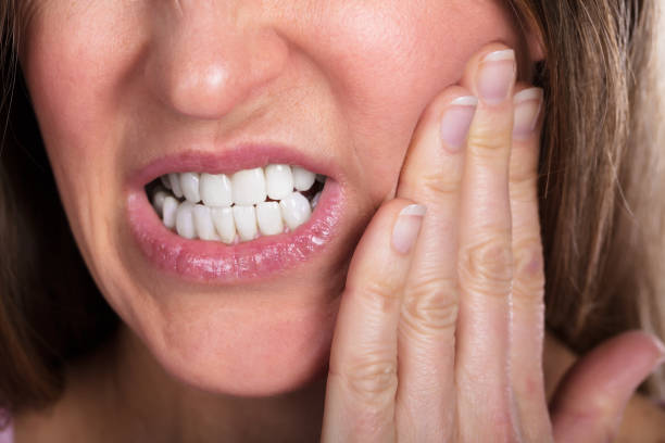 istock Woman Suffering From Toothache 958340300