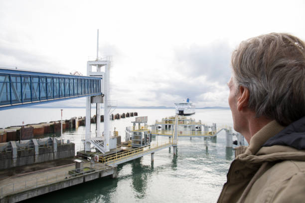 istock Man waits for ferry at Tsawwassen terminal 958340606
