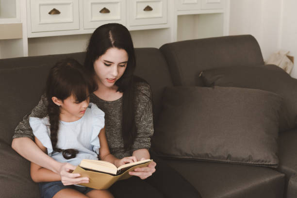 istock I am reading you a story 958340954