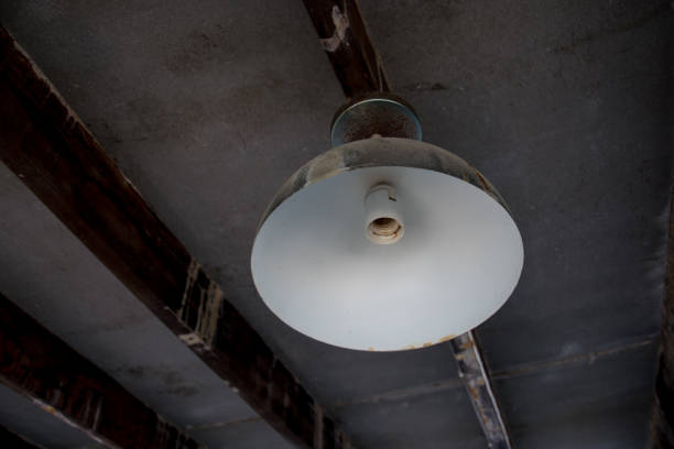 istock Electronic old vintage lamp hanging on vintage wall and ceiling house 958349216