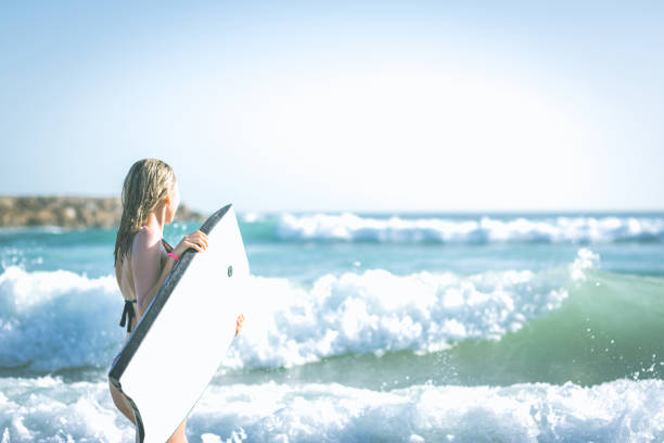 istock Body board woman 958358428