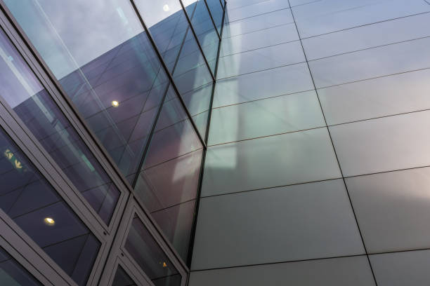 istock The glass architecture in city against a sky 958359612