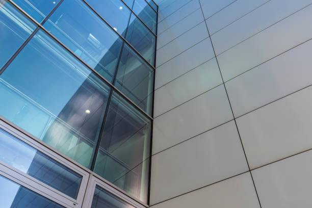 istock The glass architecture in city against a sky 958360258