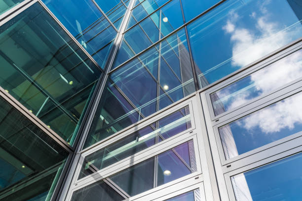 The glass architecture in city against a sky