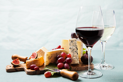 Cheese board: variety of cheeses on marble serving board