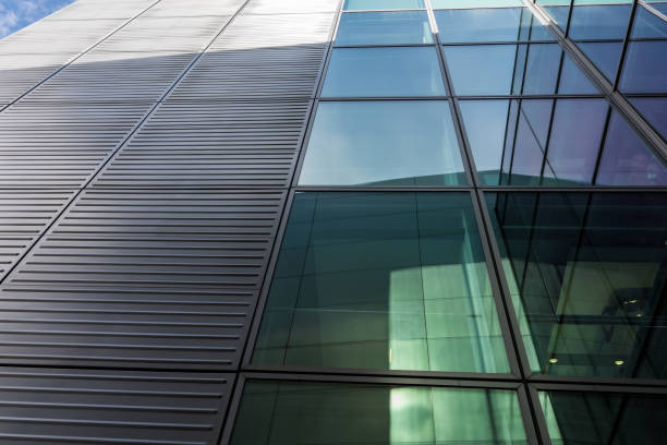istock The glass architecture in city against a sky 958375340