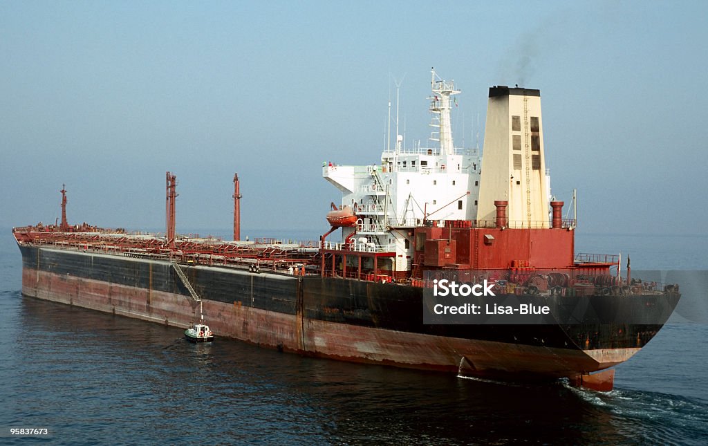 Cargoship in the fog Oil tanker in the fog. Barge Stock Photo