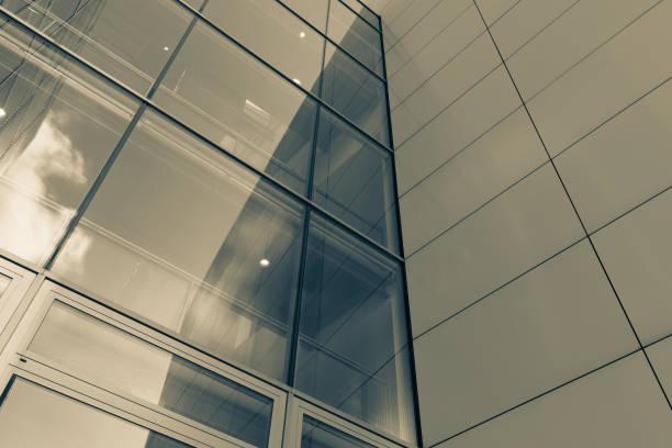 istock The glass architecture in city against a sky 958377400