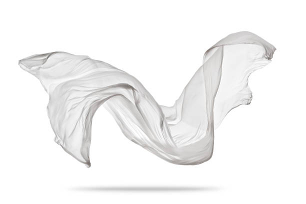 pezzo di stoffa bianca volante su sfondo bianco - industria tessile foto e immagini stock