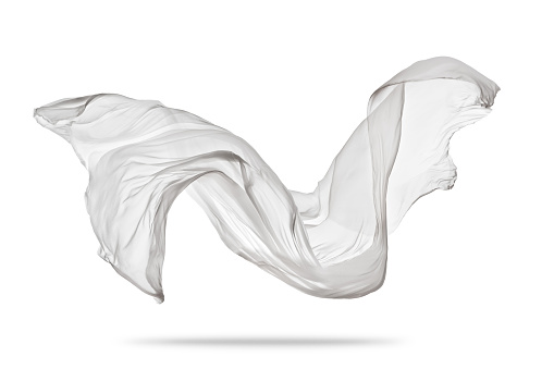 Piece of flying white cloth isolated on white background. High resolution image
