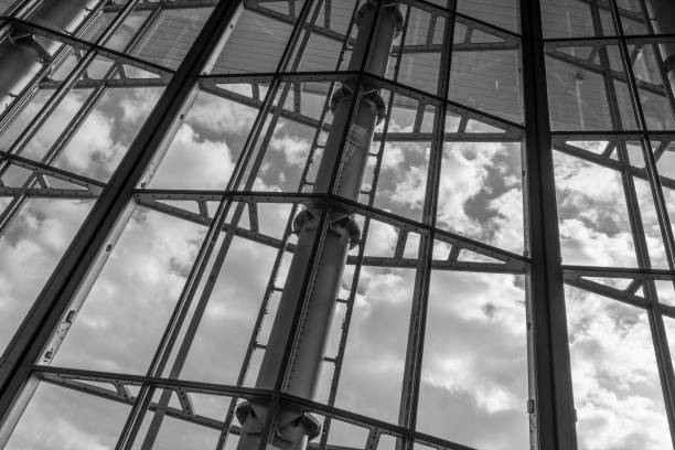 istock The glass architecture in city against a sky 958393056