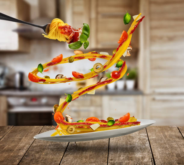 istock Flying Italian pasta with ingredients 958393094