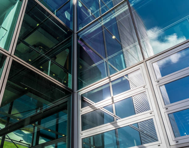 istock The glass architecture in city against a sky 958393268