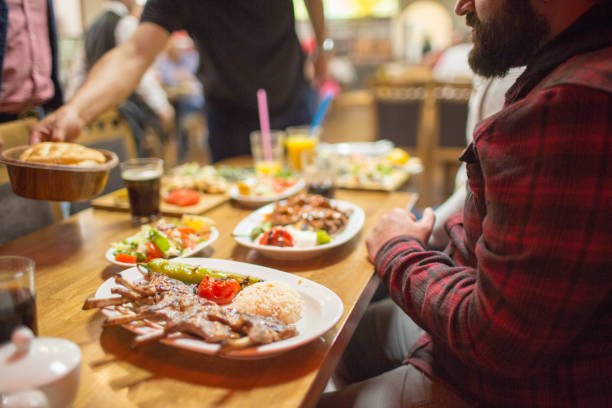 istock Middle Eastern people enjoying a traditional Iftar meal 958393510