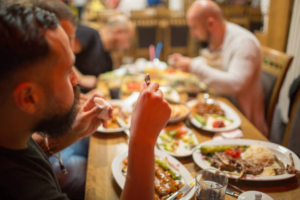 istock Muslim people enjoying Iftar meal 958395874