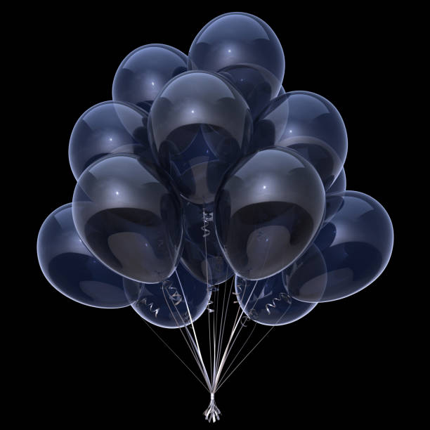 istock Black helium balloons bunch on black background 958400894