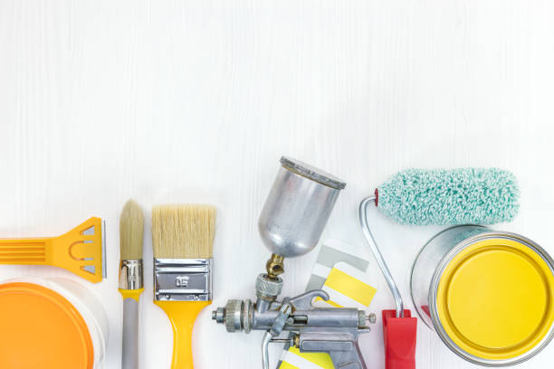 istock various painting tools on white wooden background 958403158