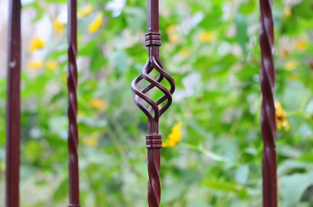 istock Image of a decorative cast metal fence. 958411908