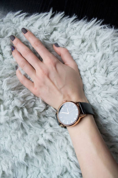 istock Wrist watch on female wrist. 958412666