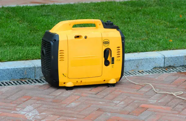 Using portable electric diesel generator on the street.