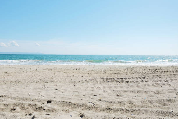 istock Beach and sea in bright sunlight 958416950