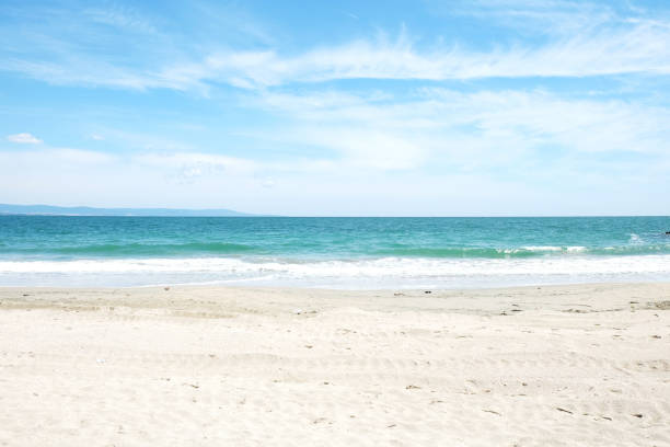 istock Beach and sea in bright sunlight 958417010
