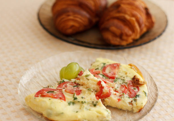 istock Delicious magnificent omelet and croissant 958419510