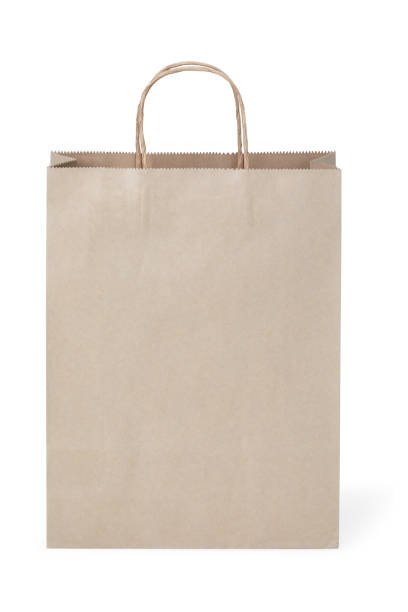 istock Brown paper bag on white background. 958424740