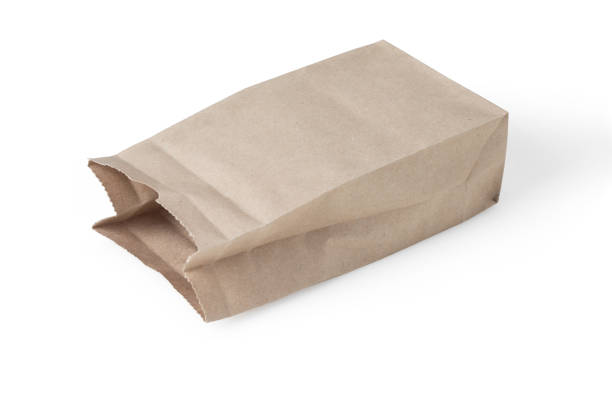 istock Brown paper bag on white background. 958424940