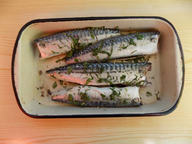 istock Preparing mackerel fish in the marinade, for frying 958425326