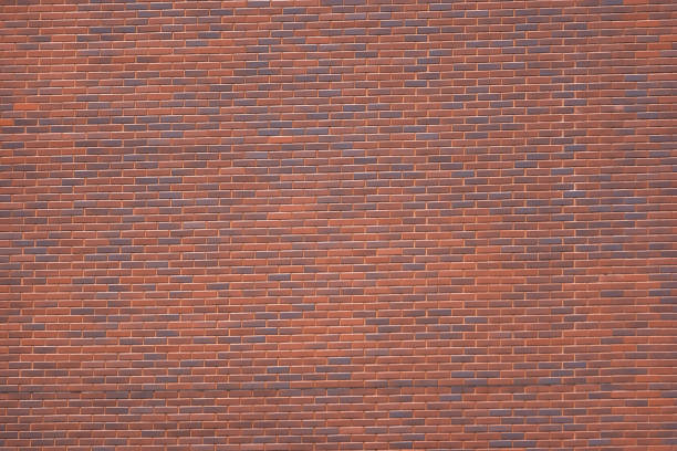istock Brick modern wall background, new modern brick wall texture, untoned 958428434