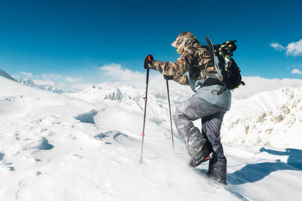 istock sportsman go with snowboard equipment 958428788