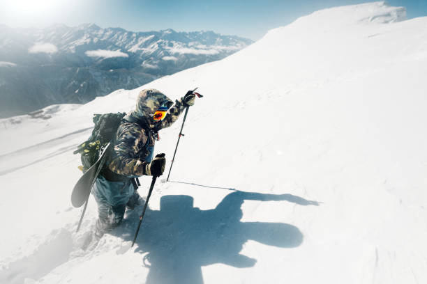 istock sportsman go with snowboard equipment 958429520