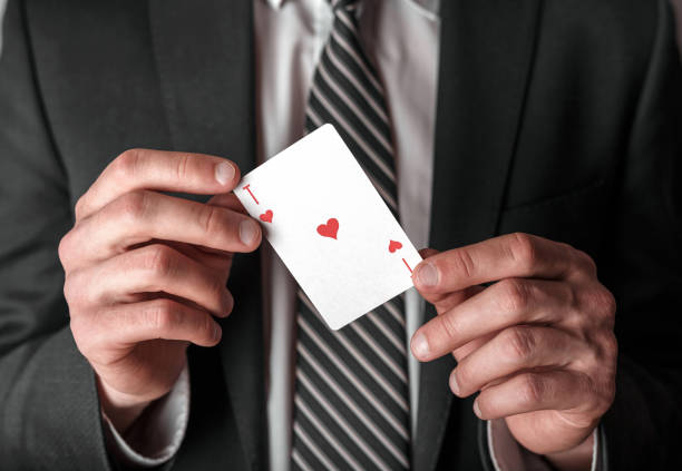 istock Businessman with ace in hands. 958437970