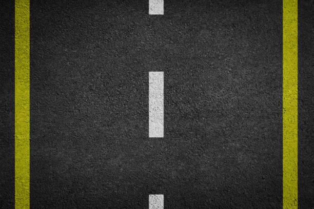 istock Asphalt road top view. Highway line marks. 958442330