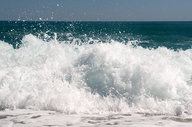 istock Big powerful wave on the sea surf 958443598