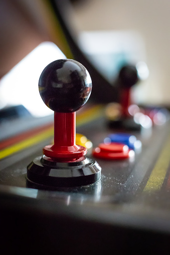 A view of a joystick of a vintage arcade videogame - Coin-Op