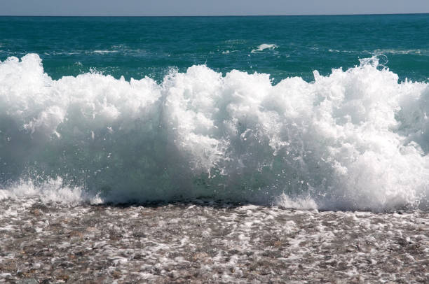istock Big powerful wave on the sea surf 958443988