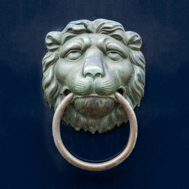 istock Bronze lion's head door knocker 958446648