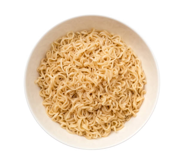 istock Ripe instant noodle in ceramic bowl top view isolated on white background, clipping path included 958446918
