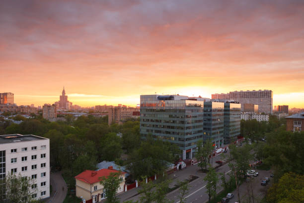 istock Beautiful sunset sky in city 958450614