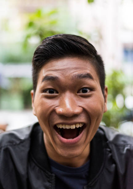 istock Happy Young Asian Man 958457856