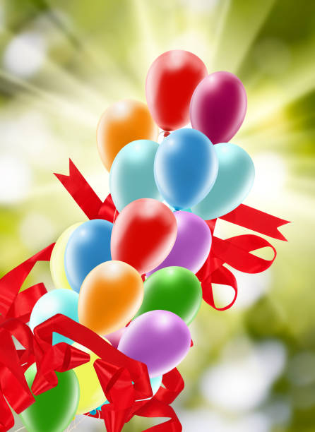 istock many balloons on a green background 958458614