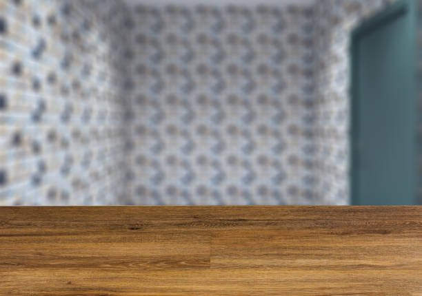 istock Clean and fresh bathroom with natural light.  The wooden table. Blurred interior. 958458956