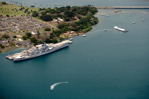 Aerial of USS Arizona memorial Aerial of USS Arizona and USS Missouri Pearl Harbor Hawaii pearl harbor stock pictures, royalty-free photos & images