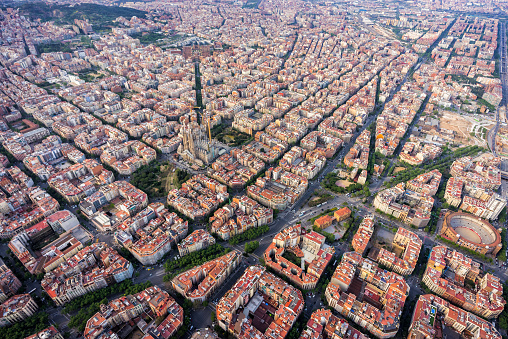 Barcelona aerial view, Eixample district with typical urban squares, Spain. Late afternoon light