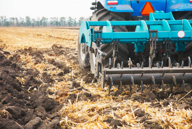 istock Agricultural machinery in the field. 958468978