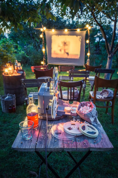 istock Small cinema with old analog films in summer garden 958469840