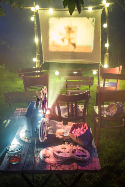 istock Retro cinema with drinks and popcorn in summer garden 958470372