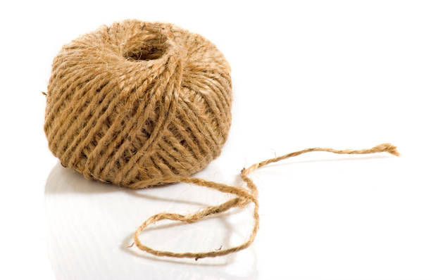 istock Image of a rope on white background closeup 958472980